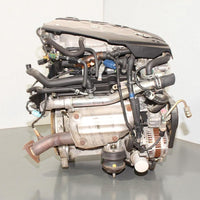 V6 engine on a gray surface with a white background