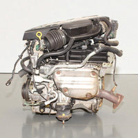 V6 engine on a gray surface with a white background